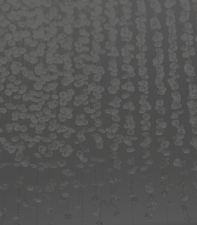 Abstract patterns in smooth, sandy landscape.