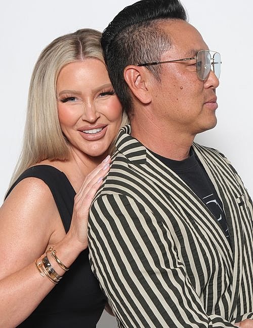 Smiling couple posing for a portrait together.