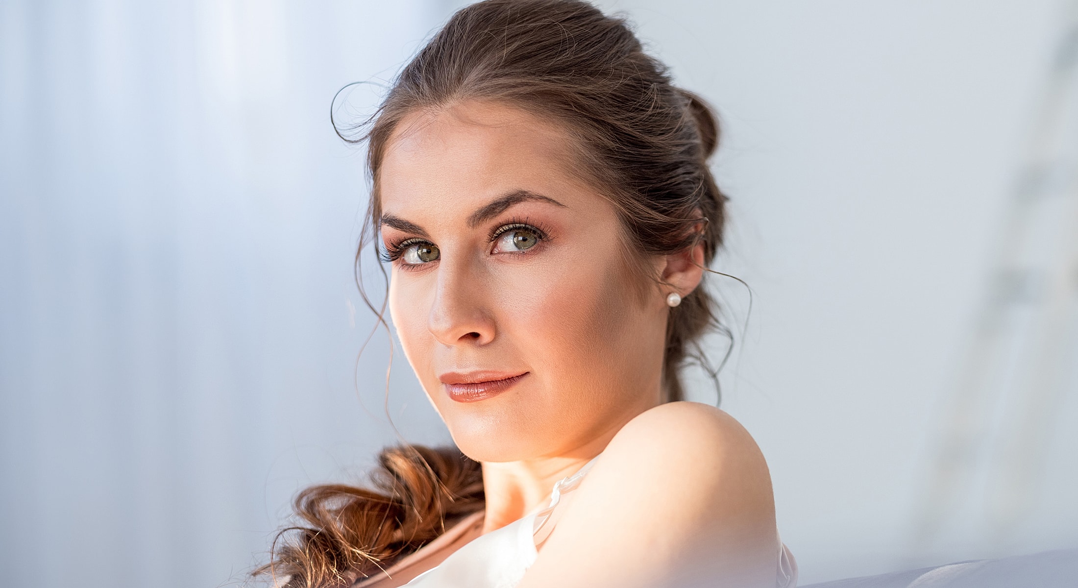 Woman with captivating eyes and natural makeup.